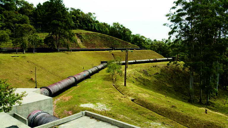 Flow Rate Measurement in full Pipes using the Transit Time Method