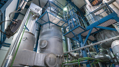Effective use of LDO fired boiler flue gas in carbonation of process liquor at alkali leaching based Tummalapalle Mill