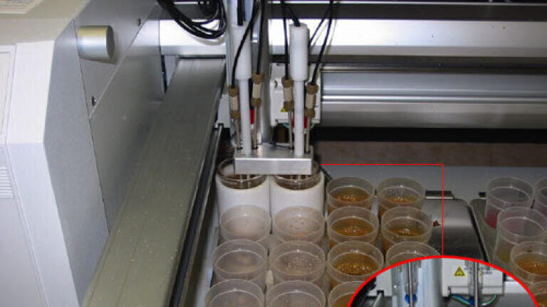 Automated soil pH Analyser preparing and analysing 2 different samples simultaneously.
