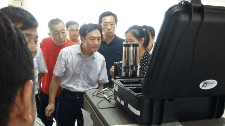 Pictured is Zhai Qing, Vice Minister of the Ministry of Environmental Protection, People's Republic of China at the rescue headquarters for the August 12th catastrophe.