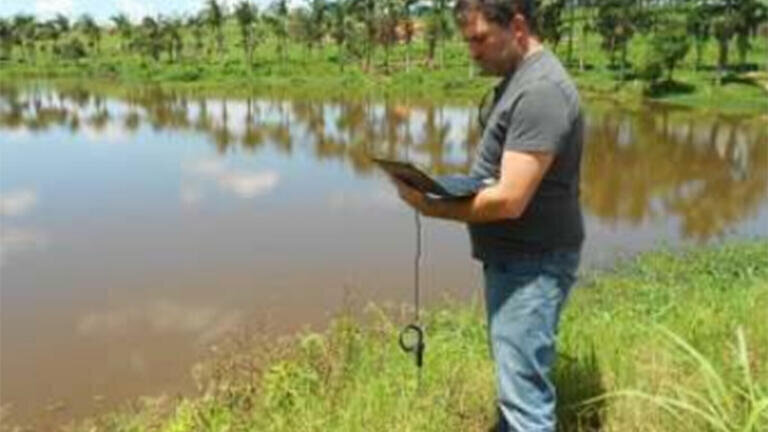Hydrocarbon Detector Measures Rural River After Oil Spill Incident Involving a Diesel Truck
