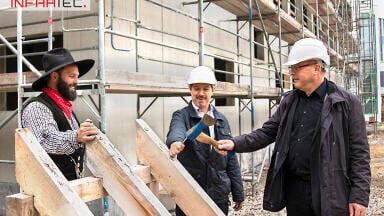 Infratec host topping-out ceremony for new building complex shell for future cleanroom and office areas