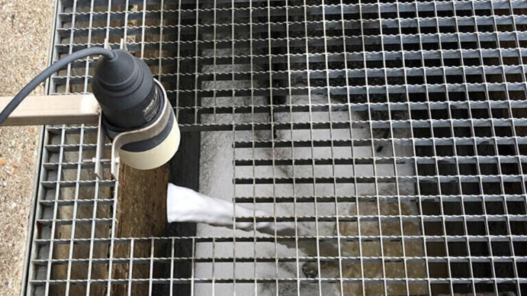 Level transmitter for reliable disposal of sewage sludge