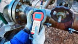 Non-invasive clamp-on flowmeters