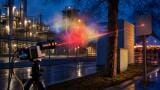 Reflected light from everyday surfaces enables remote detection of hazardous aerosols